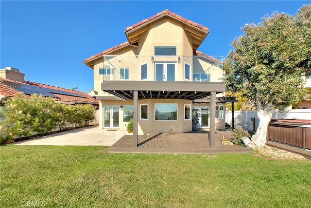 27 Burriana, San Clemente, CA 92672 - rear view of property with a balcony, french doors, stucco siding, a hot tub, and a tile roof