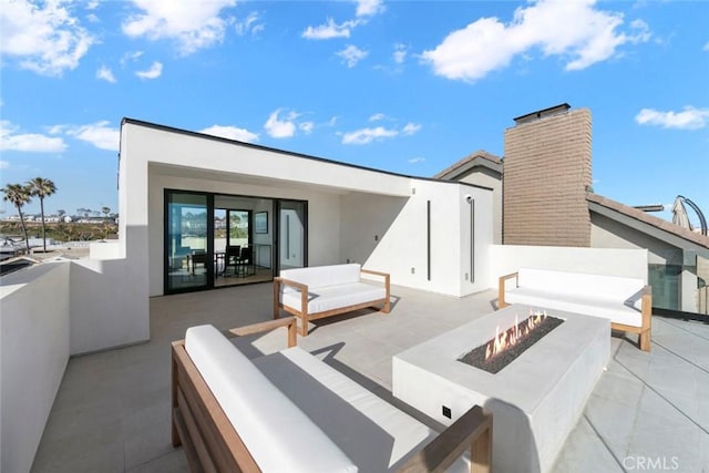 5007 Seashore Dr, Newport Beach, CA 92663 - view of patio / terrace featuring an outdoor living space with a fire pit