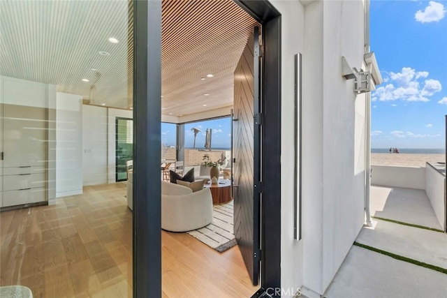 5007 Seashore Dr, Newport Beach, CA 92663 - hallway featuring recessed lighting and floor to ceiling windows