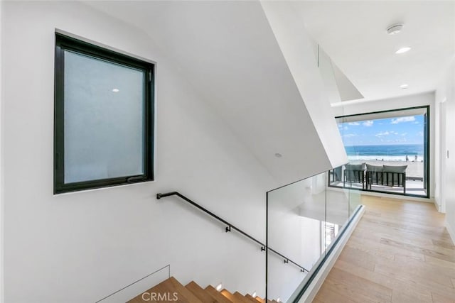 5007 Seashore Dr, Newport Beach, CA 92663 - stairway featuring wood finished floors and recessed lighting
