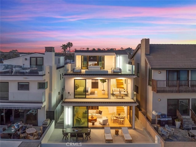 5007 Seashore Dr, Newport Beach, CA 92663 - back of house with stucco siding
