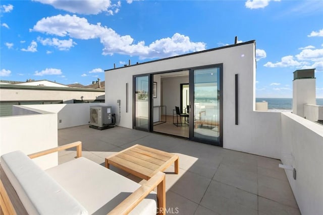 5007 Seashore Dr, Newport Beach, CA 92663 - view of patio featuring a cooling unit and a water view