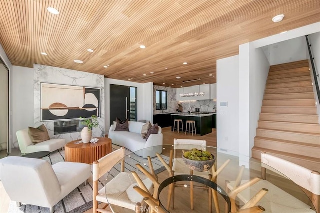 5007 Seashore Dr, Newport Beach, CA 92663 - living area with recessed lighting, stairs, and wooden ceiling