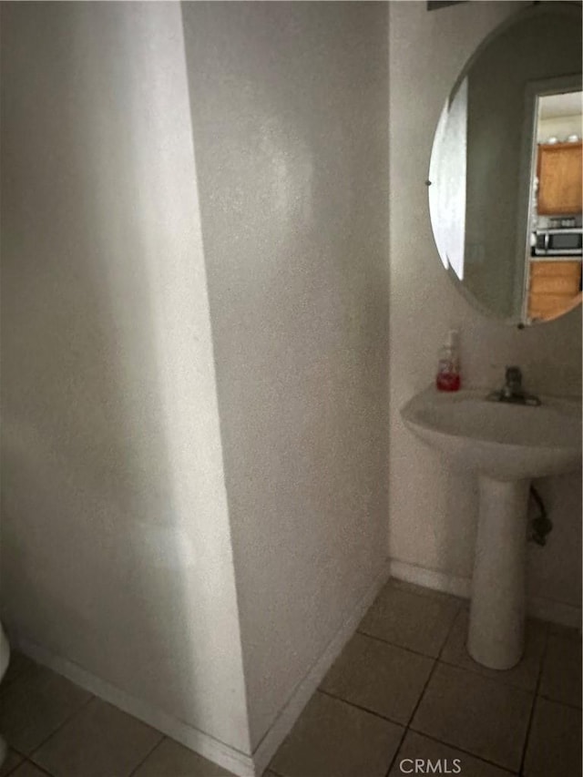 336 Pyramid Ave, Merced, CA 95341 - bathroom with tile patterned flooring and baseboards