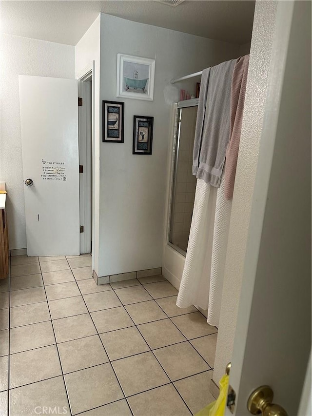 336 Pyramid Ave, Merced, CA 95341 - bathroom with tile patterned floors, vanity, combined bath / shower with glass door, and baseboards