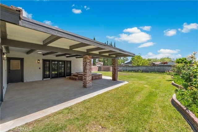 view of yard with a patio area