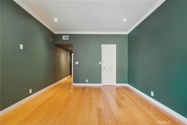 2101 E 21st St Unit 310, Signal Hill, CA 90755 - unfurnished room with light wood-type flooring, baseboards, crown molding, and recessed lighting