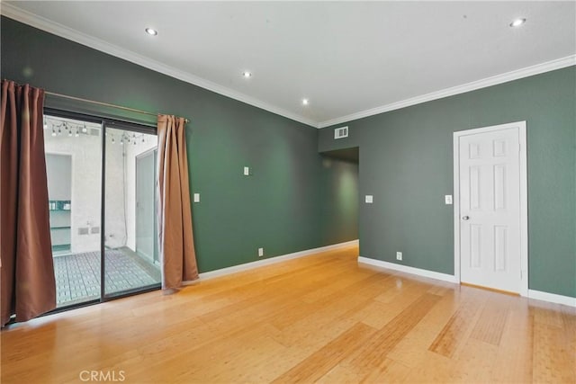 2101 E 21st St Unit 310, Signal Hill, CA 90755 - spare room featuring light wood finished floors, crown molding, baseboards, and recessed lighting