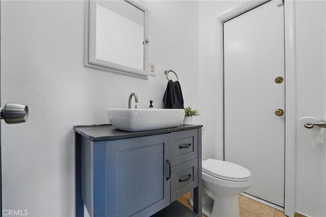 9489 Muroc St, Bellflower, CA 90706 - bathroom featuring vanity, toilet, and tile patterned flooring