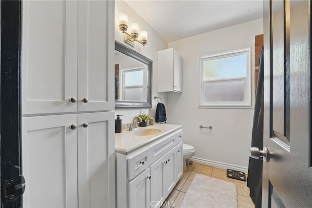 9489 Muroc St, Bellflower, CA 90706 - bathroom with plenty of natural light, vanity, toilet, and tile patterned floors