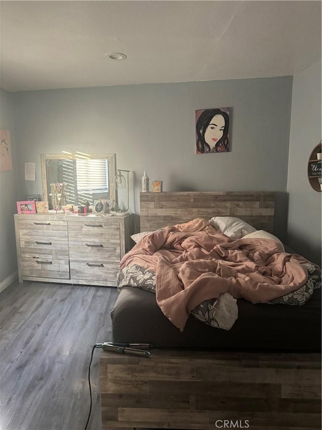 9489 Muroc St, Bellflower, CA 90706 - bedroom featuring wood finished floors and baseboards
