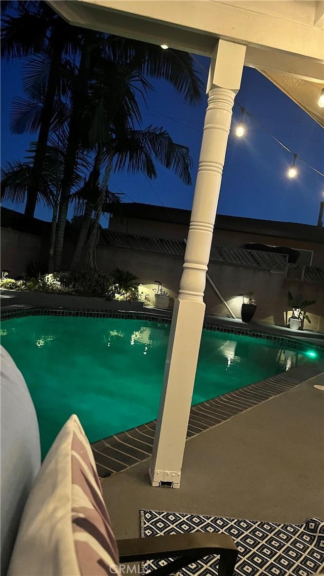 9489 Muroc St, Bellflower, CA 90706 - pool at night featuring an outdoor pool