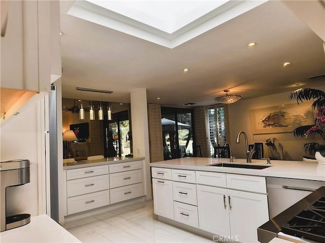6 Whittier Ct, Rancho Mirage, CA 92270 - kitchen featuring a sink, white cabinetry, plenty of natural light, light countertops, and recessed lighting