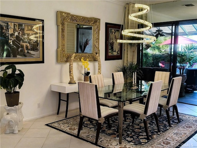 6 Whittier Ct, Rancho Mirage, CA 92270 - tiled dining area featuring crown molding, a chandelier, and baseboards