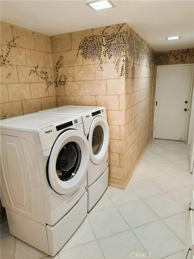 6 Whittier Ct, Rancho Mirage, CA 92270 - washroom featuring tile walls, washer and clothes dryer, and light tile patterned flooring