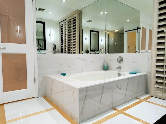6 Whittier Ct, Rancho Mirage, CA 92270 - full bathroom featuring a garden tub, a marble finish shower, and recessed lighting