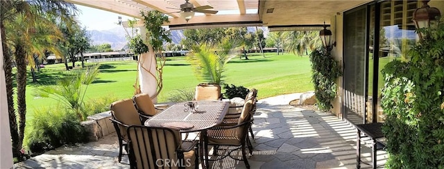 6 Whittier Ct, Rancho Mirage, CA 92270 - view of patio with ceiling fan, a mountain view, and outdoor dining space