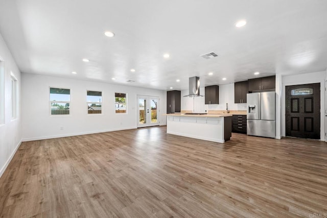 4585 Mount Henry Pl, San Diego, CA 92117 - unfurnished living room featuring recessed lighting, wood finished floors, baseboards, and a sink