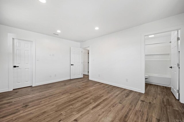 4585 Mount Henry Pl, San Diego, CA 92117 - unfurnished bedroom featuring wood finished floors, recessed lighting, and baseboards