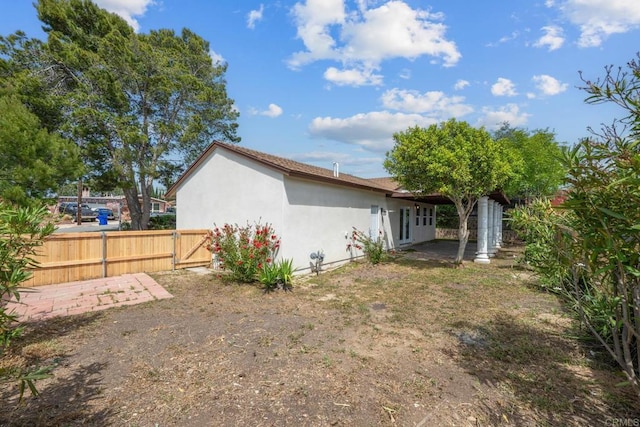 4585 Mount Henry Pl, San Diego, CA 92117 - view of property exterior featuring stucco siding and a gate