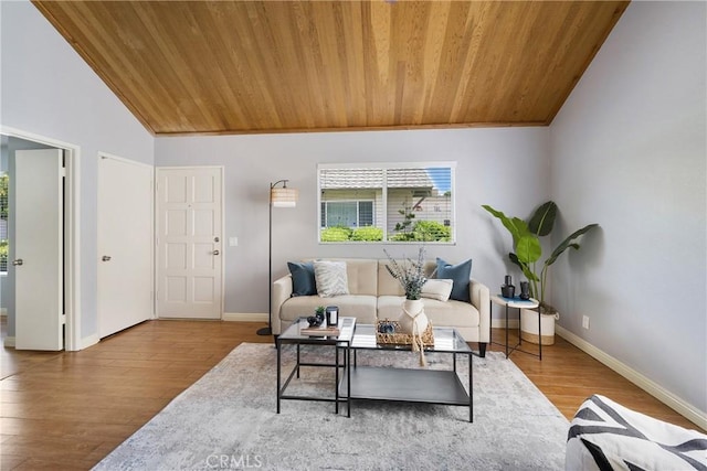 22986 Caminito Regalo Unit 92, Laguna Hills, CA 92653 - living room featuring wooden ceiling, vaulted ceiling, baseboards, and wood finished floors