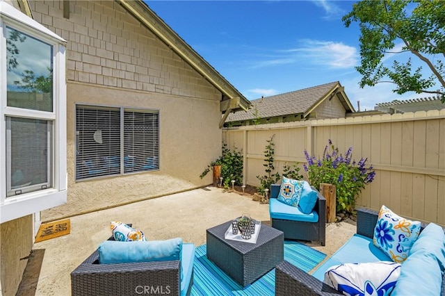 22986 Caminito Regalo Unit 92, Laguna Hills, CA 92653 - view of patio / terrace with outdoor lounge area and fence