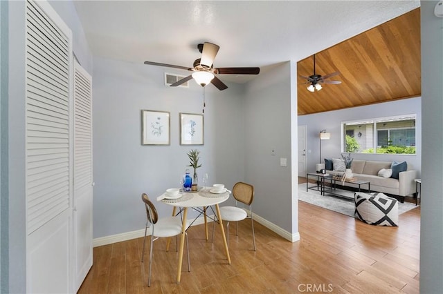 22986 Caminito Regalo Unit 92, Laguna Hills, CA 92653 - dining room with baseboards, light wood-style flooring, ceiling fan, and vaulted ceiling