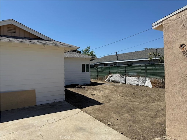 view of patio with fence