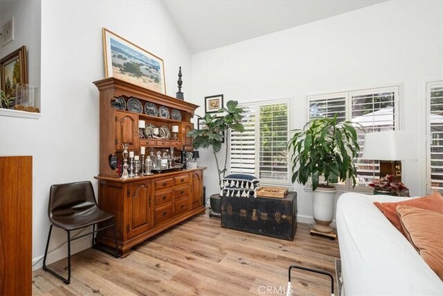 1762 Southfork Pl, Paso Robles, CA 93446 - sitting room featuring light wood-style floors and high vaulted ceiling