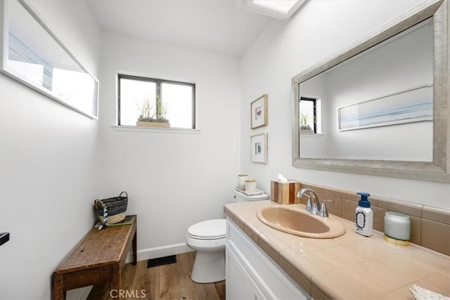 1762 Southfork Pl, Paso Robles, CA 93446 - bathroom with vanity, toilet, healthy amount of natural light, and wood finished floors