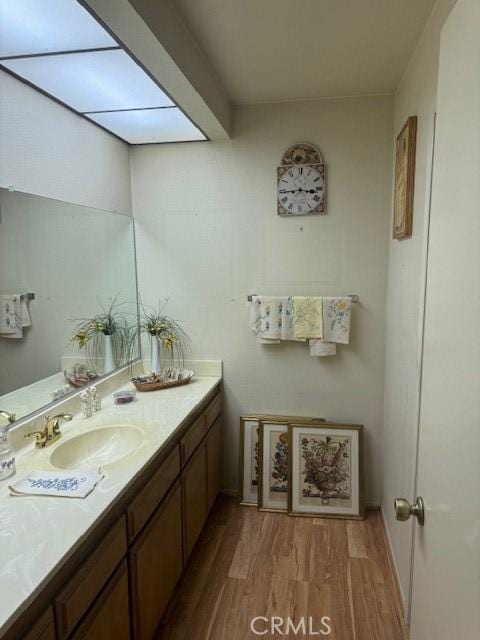 512 Via Ln, Paloma, Riverside, CA 92507 - bathroom with wood finished floors and vanity