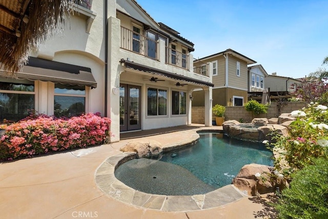4067 Hoosier Lawn Way, Yorba Linda, CA 92886 - view of pool featuring a ceiling fan, fence, a patio, a pool with connected hot tub, and french doors