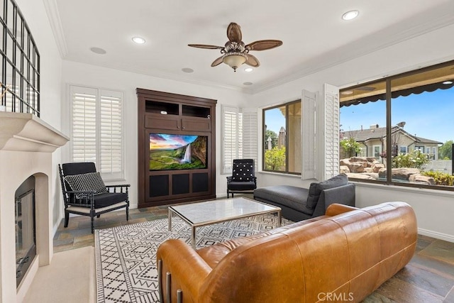 4067 Hoosier Lawn Way, Yorba Linda, CA 92886 - living area featuring stone tile floors, a ceiling fan, ornamental molding, recessed lighting, and baseboards