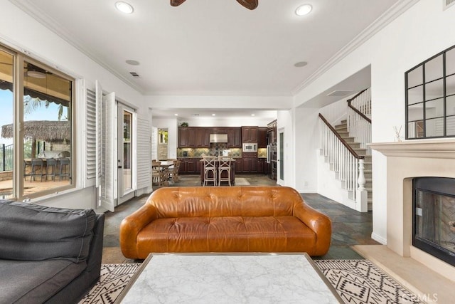 4067 Hoosier Lawn Way, Yorba Linda, CA 92886 - living area with crown molding, stairs, recessed lighting, and a fireplace with flush hearth