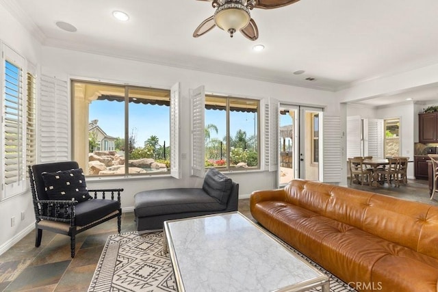 4067 Hoosier Lawn Way, Yorba Linda, CA 92886 - living room with crown molding, baseboards, a ceiling fan, recessed lighting, and stone finish flooring
