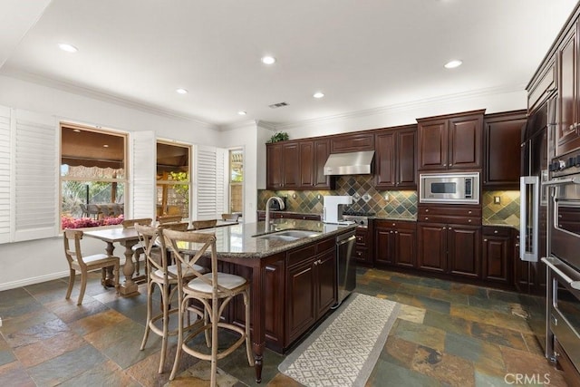 4067 Hoosier Lawn Way, Yorba Linda, CA 92886 - kitchen with a sink, appliances with stainless steel finishes, stone tile flooring, decorative backsplash, and crown molding