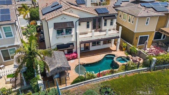 4067 Hoosier Lawn Way, Yorba Linda, CA 92886 - rear view of property featuring a balcony, a tiled roof, stucco siding, a patio, and a pool with connected hot tub