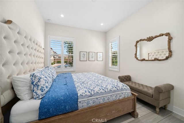 143 Trumpet Flower, Irvine, CA 92618 - bedroom featuring baseboards, wood finished floors, and recessed lighting