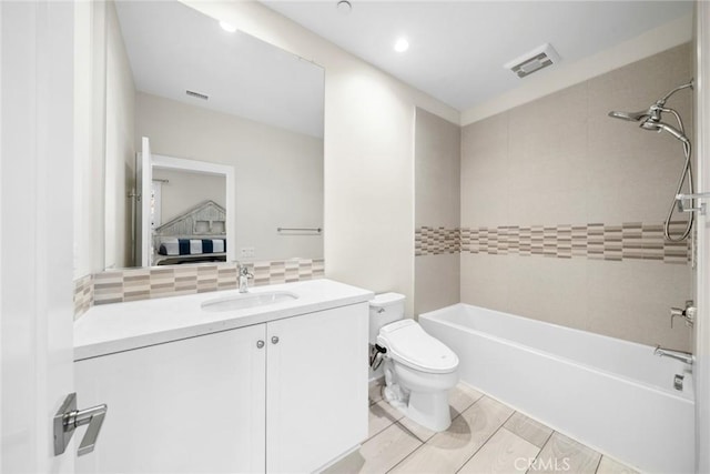 143 Trumpet Flower, Irvine, CA 92618 - full bathroom featuring toilet, backsplash, vanity, shower / washtub combination, and recessed lighting