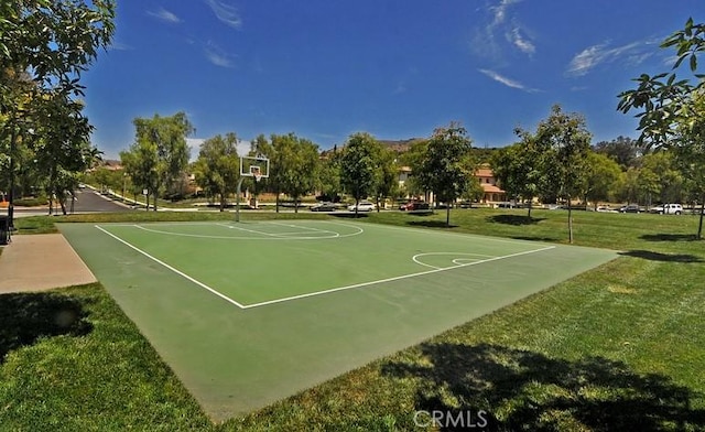 143 Trumpet Flower, Irvine, CA 92618 - view of basketball court with community basketball court and a yard
