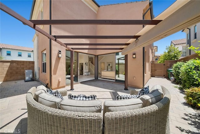 143 Trumpet Flower, Irvine, CA 92618 - view of patio with an outdoor hangout area, fence, and a gate