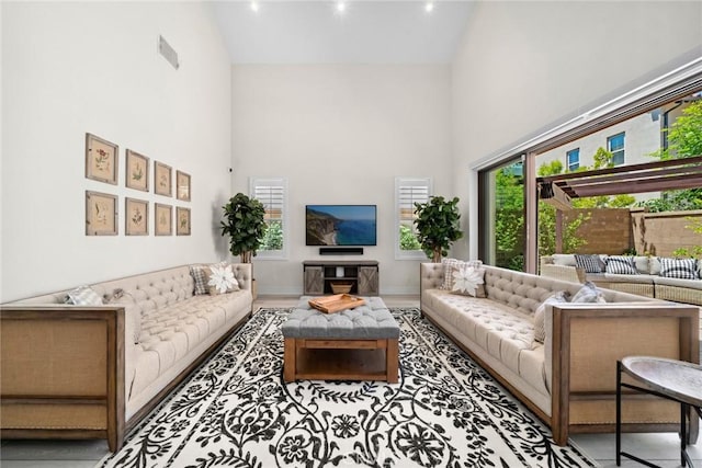 143 Trumpet Flower, Irvine, CA 92618 - living room with high vaulted ceiling and baseboards