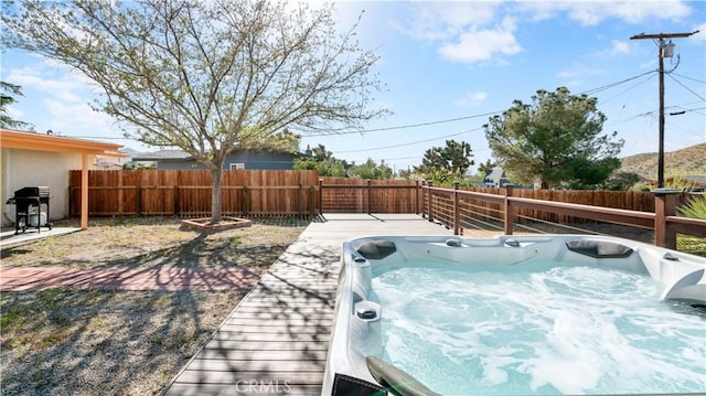 57966 El Dorado Dr, Yucca Valley, CA 92284 - view of swimming pool featuring a fenced backyard, a hot tub, and grilling area