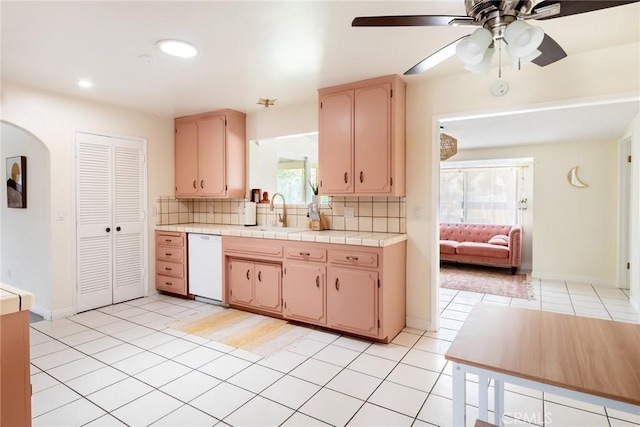 57966 El Dorado Dr, Yucca Valley, CA 92284 - kitchen featuring white dishwasher, a sink, ceiling fan, tasteful backsplash, and recessed lighting