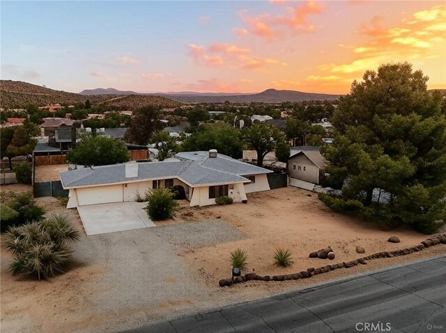57966 El Dorado Dr, Yucca Valley, CA 92284 - aerial view at dusk of a mountain view