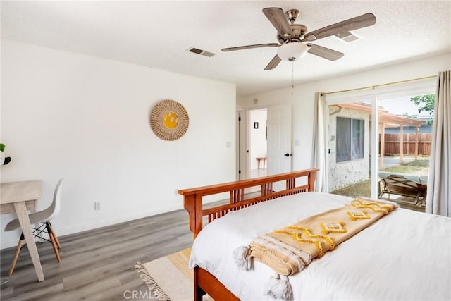 57966 El Dorado Dr, Yucca Valley, CA 92284 - bedroom with access to exterior, light wood-style flooring, baseboards, and ceiling fan