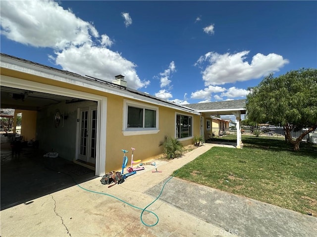 23610 David Ln Unit 1, Moreno Valley, CA 92557 - rear view of property featuring stucco siding and a patio area
