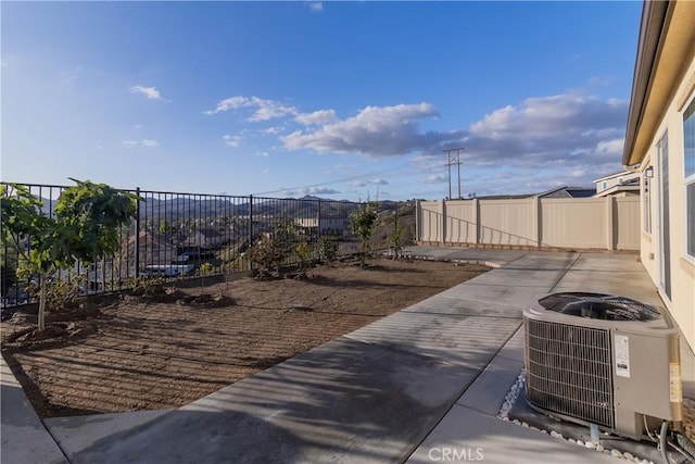 41207 Alegria Ln, Lake Elsinore, CA 92532 - fenced backyard featuring central air condition unit and a patio