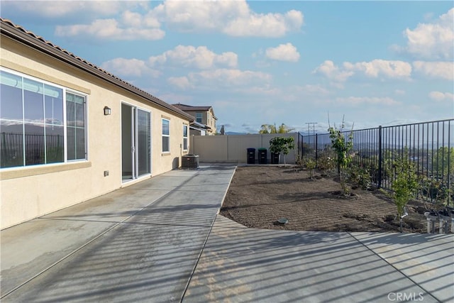 41207 Alegria Ln, Lake Elsinore, CA 92532 - view of patio / terrace featuring a fenced backyard and central AC
