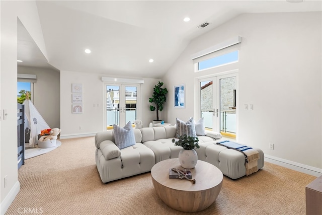 1554 E Oceanfront, Newport Beach, CA 92661 - living room featuring lofted ceiling, healthy amount of natural light, light carpet, baseboards, and recessed lighting